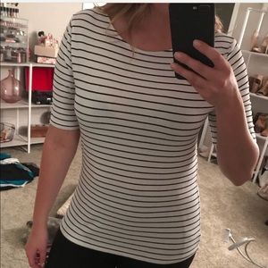 A New Day, black and white striped shirt.